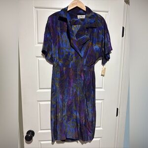 Vintage silk dress 8 brand new with original tags. Shoulder pads. Collared